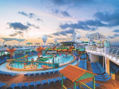 Navigator of the Seas’ Caribbean resort-style poolscape touts more pool for everyone, including a Splash Pad for tots; a signature The Lime and Coconut bar; and tasty dining options like American diner classics at Johnny Rockets Express