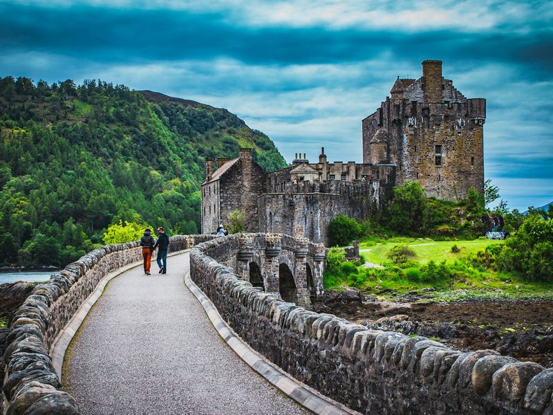 Crossing the bridge to Eilean Donan Castle which is located on Kyle Of Lochalsh which overlooks the Isle of Skye. .jpg